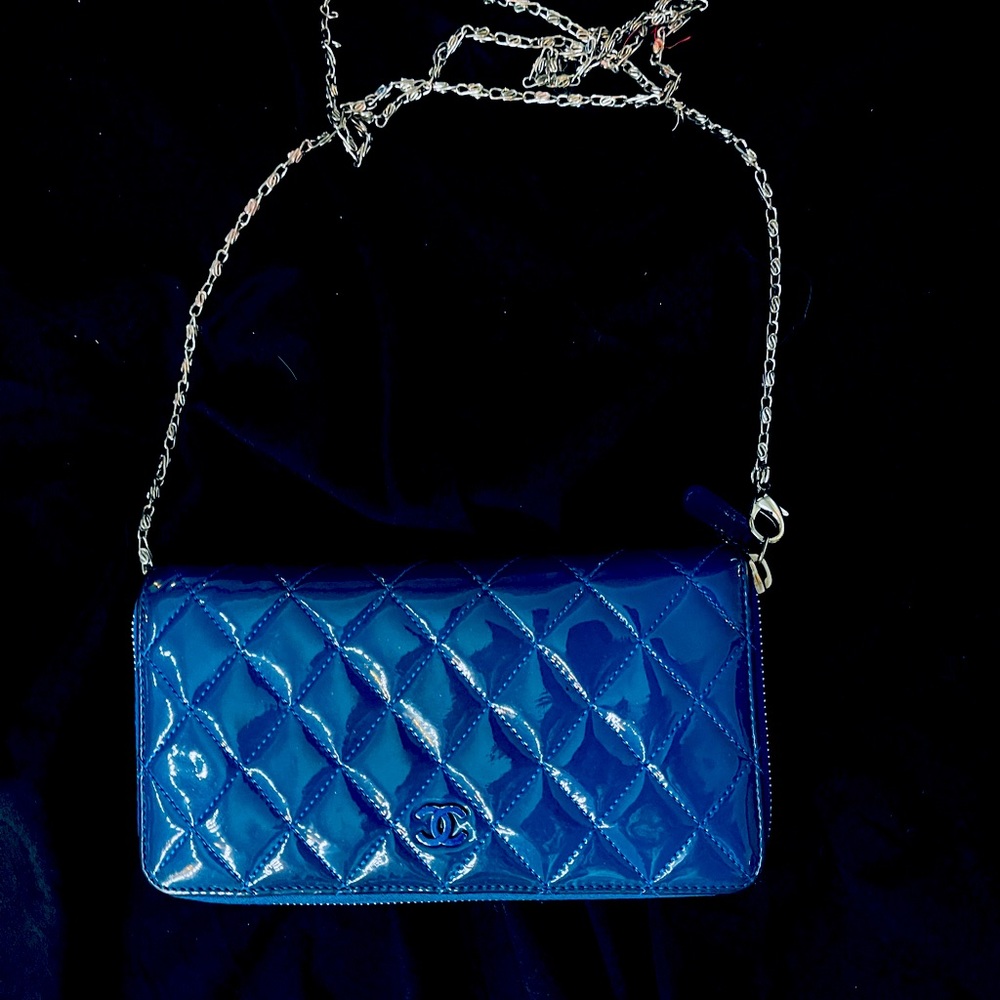 Chanel quilted zip around  patent leather purse.